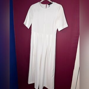 Zara white jumpsuit with short sleeves and pleated pants